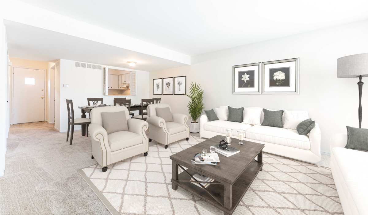 Well-furnished living room in the apartment at Oaks On Bonhomme in University City, Missouri