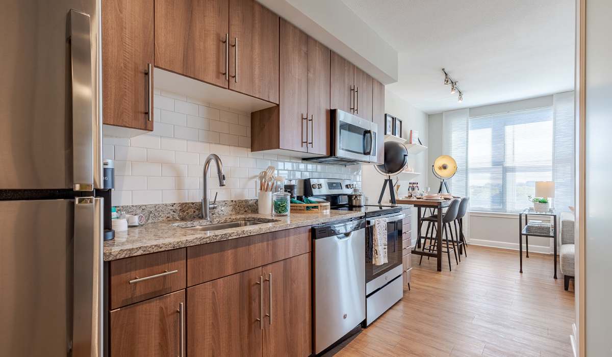Kitchen with wood-style flooring at Jefferson Marketplace in Washington D.C., District of Columbia