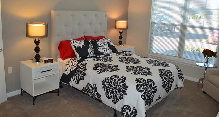 Beautifully designed bedroom at Rivers Pointe Apartments in Liverpool, NY