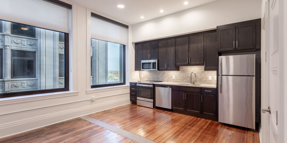 Spacious kitchen with hardwood flooring and large windows at Mutual on Main in Richmond, Virginia