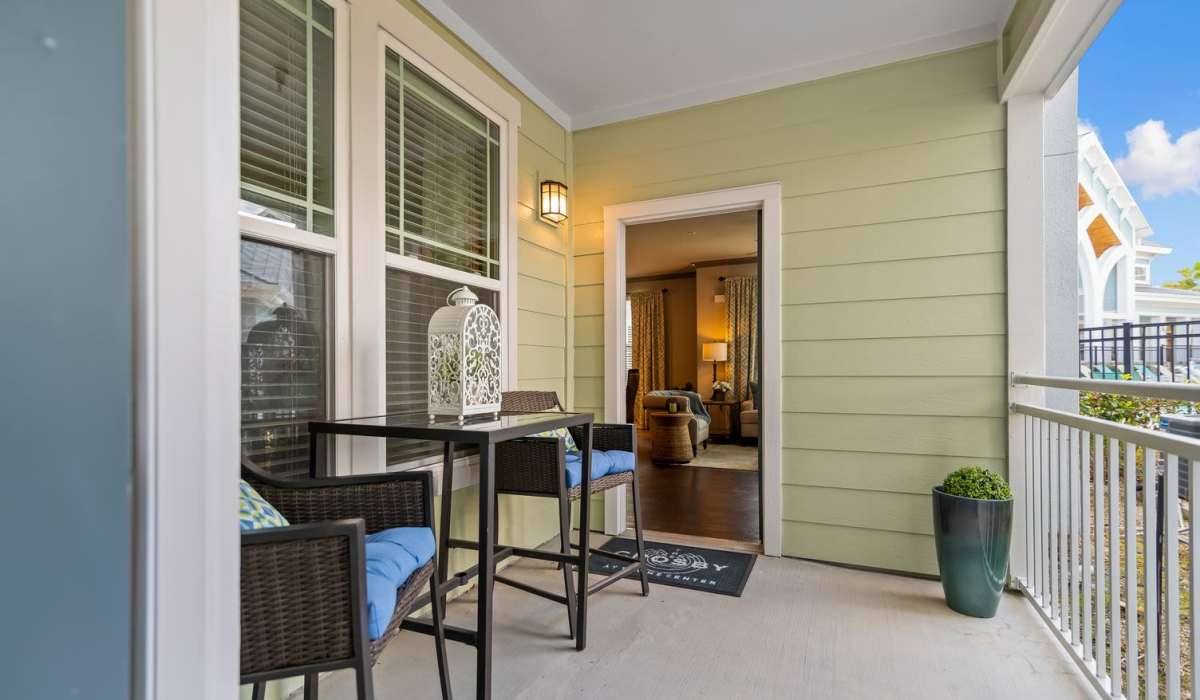 Private balcony with seating spaces at The Crosby at Towne Center in Sanford, Florida