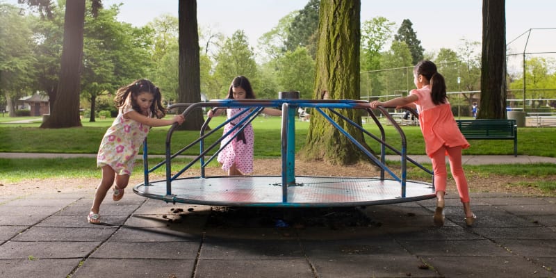 Kids playing at a park near Hamilton Springs Apartments in Baltimore, Maryland