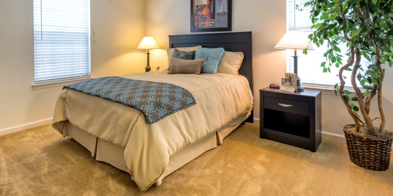 A furnished bedroom in a home at The Village at Serra Mesa in San Diego, California