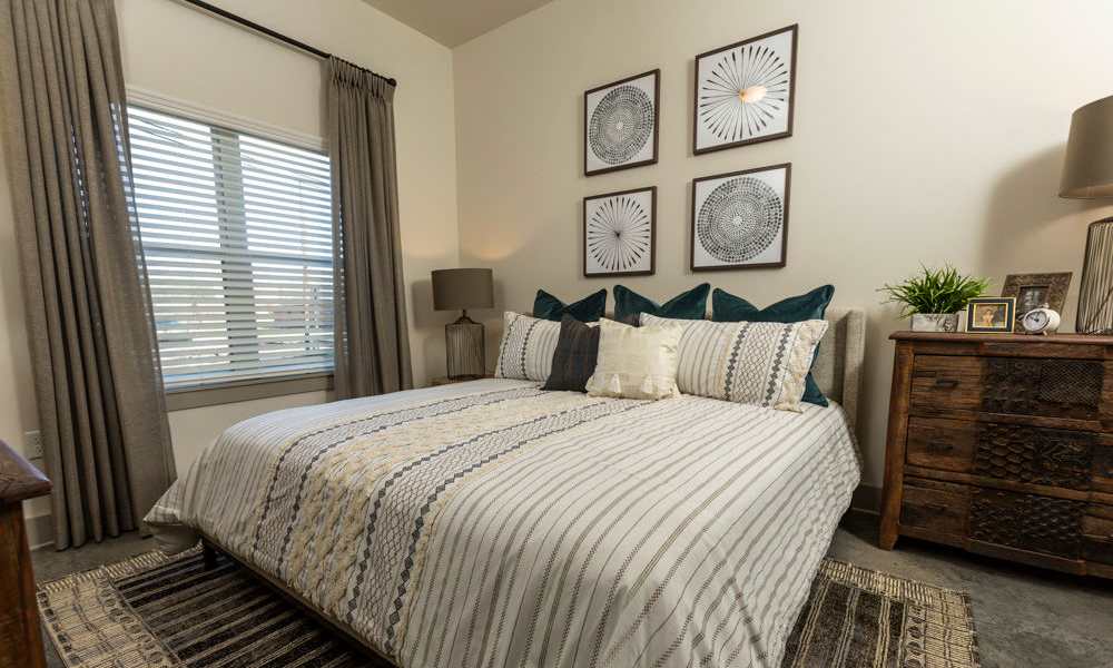 Cozy bedroom in a model home at Beacon Station in Augusta, Georgia