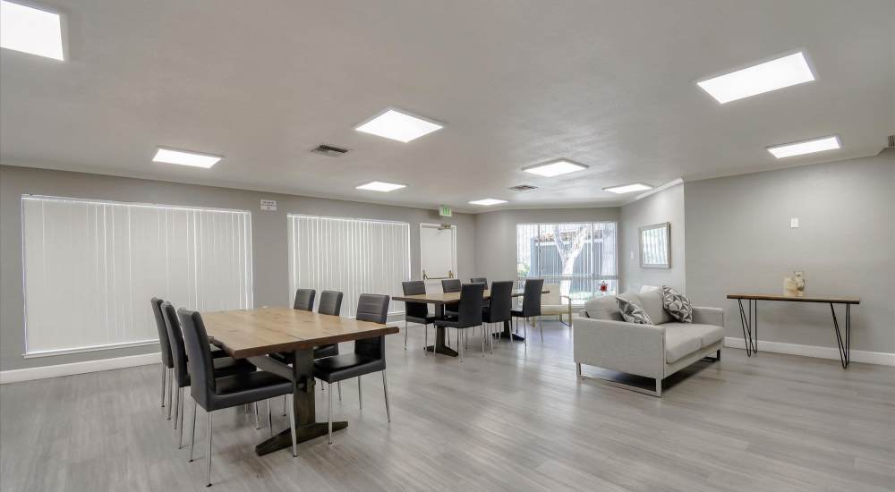 Spacious community clubhouse with dining area at Civic Plaza in Santa Clara, California