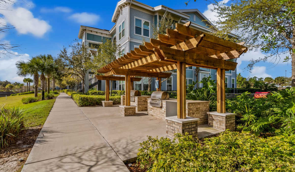 Community barbeque spaces at The Crosby at Towne Center in Sanford, Florida