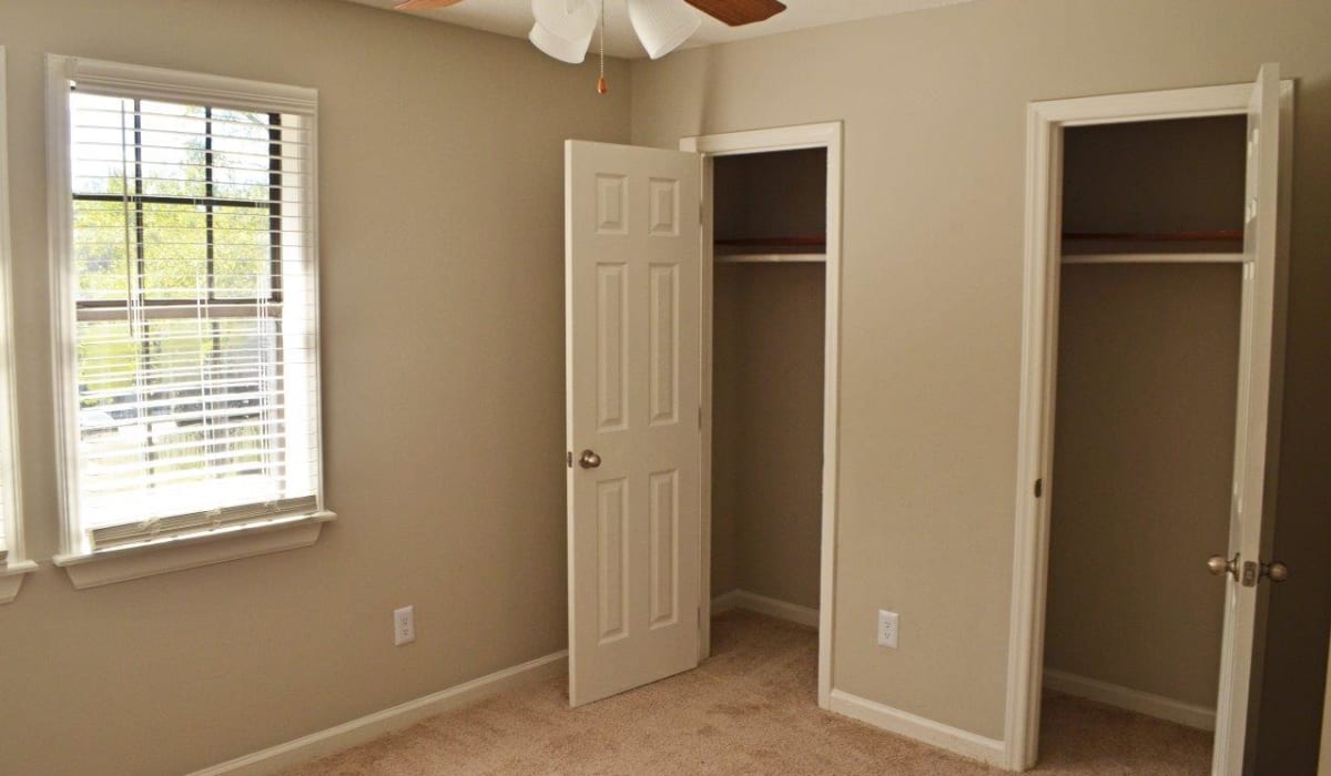 A furnished bedroom at Forest Edge Townhomes in Raleigh, North Carolina