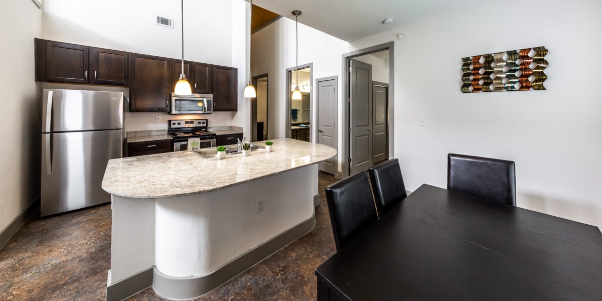 Dining room and kitchen at Regents West at 26th in Austin, Texas