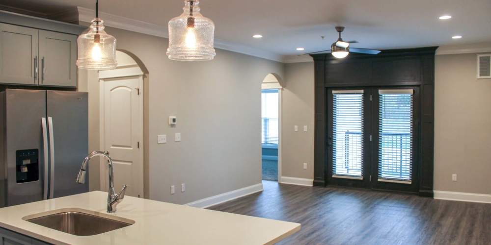 Spacious island kitchen with ambient lighting at West Edge in Lynchburg, Virginia