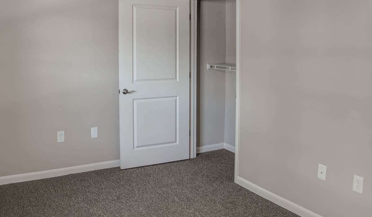 Bedroom with spacious closets at Bell Diamond Manor in Norfolk, Virginia