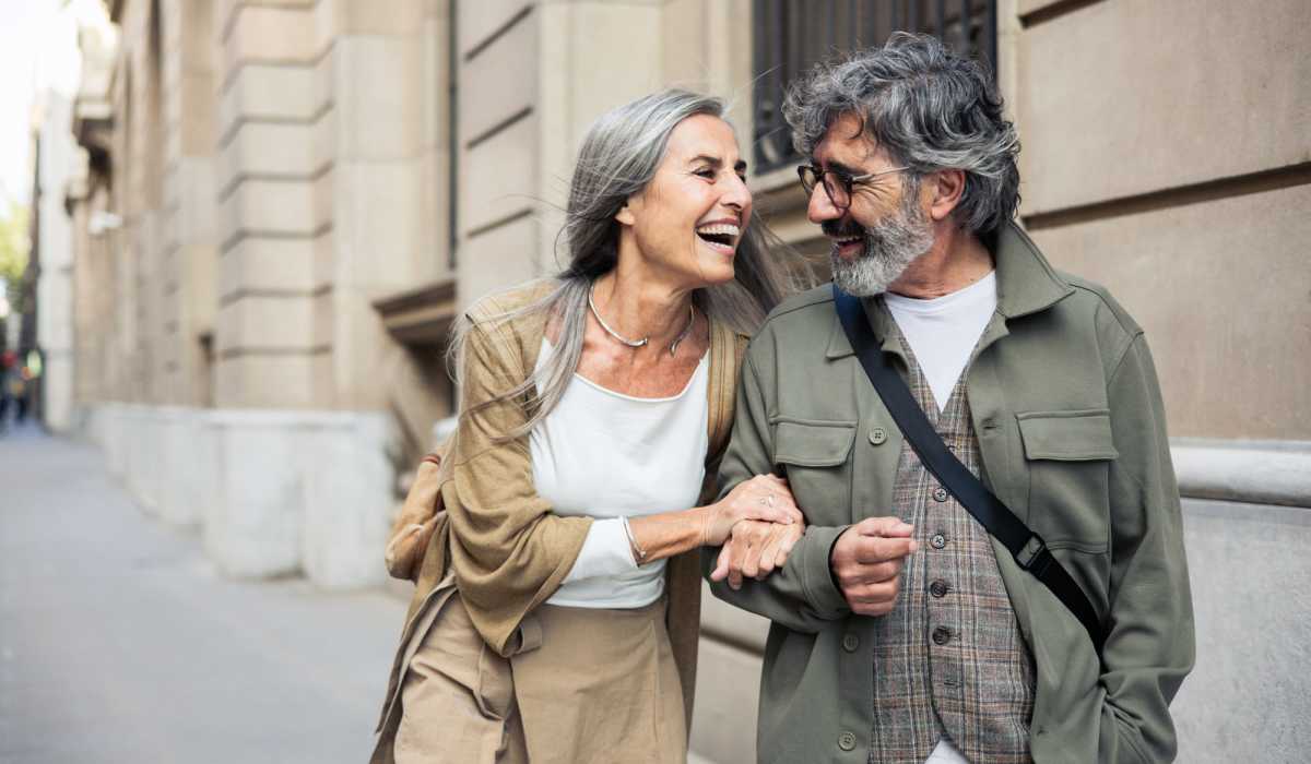 Resident couple walking downtown near Heirloom at Torrey Pines in Las Vegas, Nevada