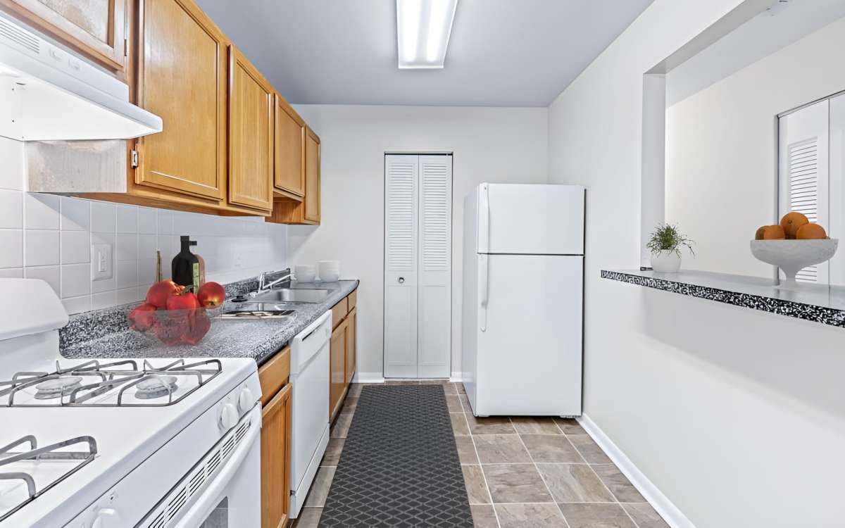 Modern apartment kitchen with energy efficient appliances at Fox Club in Capitol Heights, Maryland