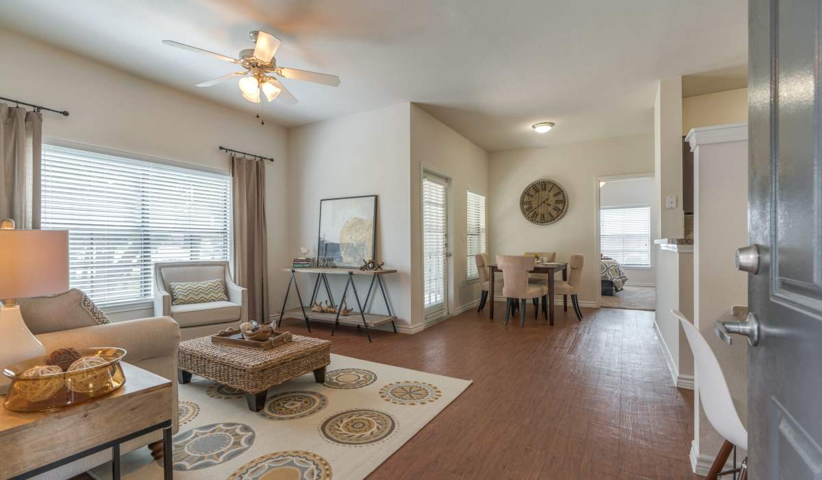 Wood-style floored apartment with spacious living space and dining area at Edgewater at Klein in Spring, Texas