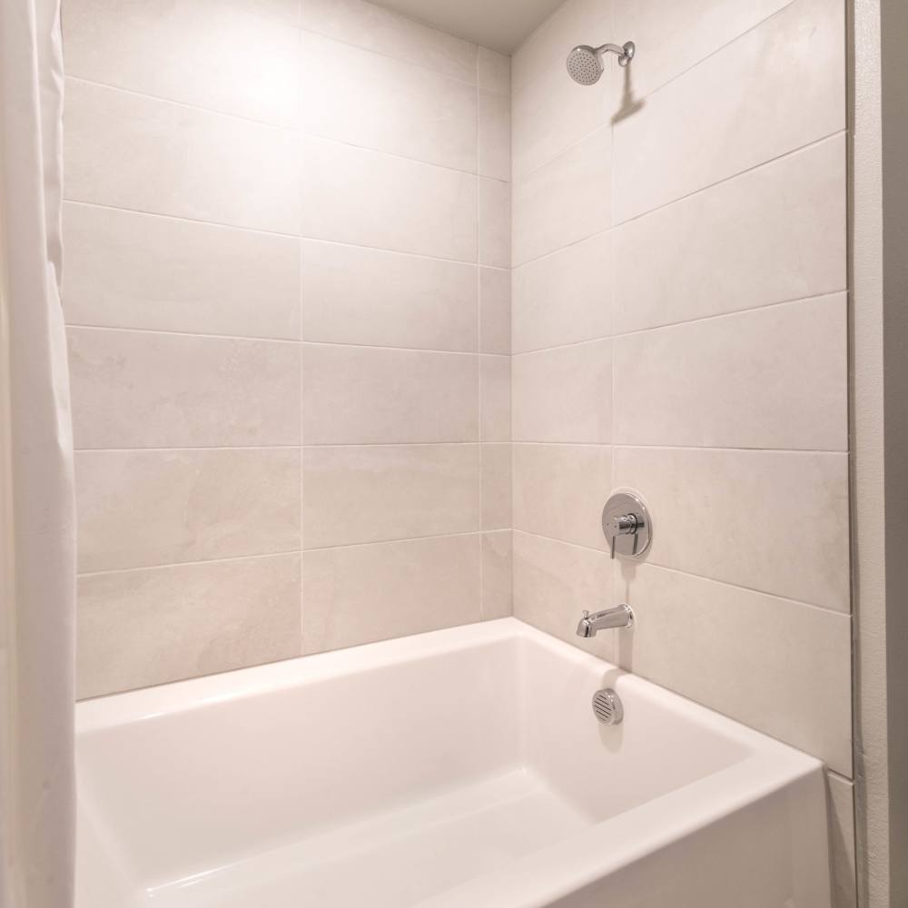 Ceramic tiles in the bathtub at Hall Street Flats in Dallas, Texas