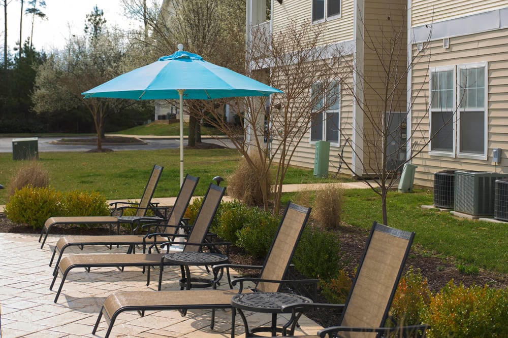 Sun deck with ample seating at Park Villas Apartments in Lexington Park, Maryland