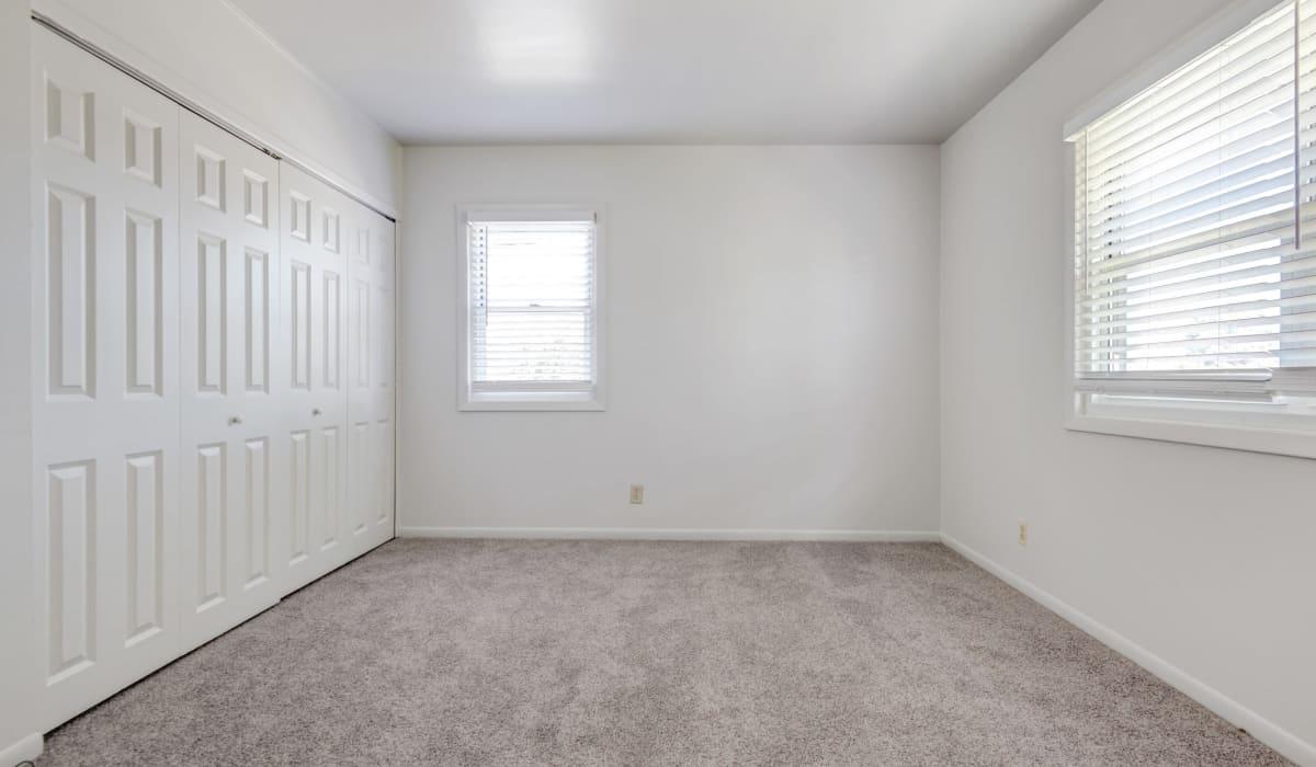 A spacious bedroom with a closet at Rochester Highlands in Rochester, New York