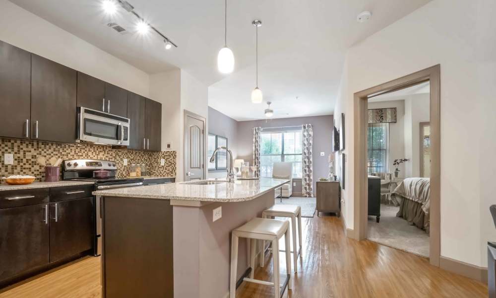Kitchen with a breakfast counter at Grapevine Station in Grapevine,Texas