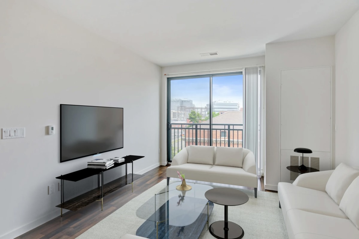Wood-style flooring in an apartment living room at The Key at Yale and Towne in Stamford, Connecticut