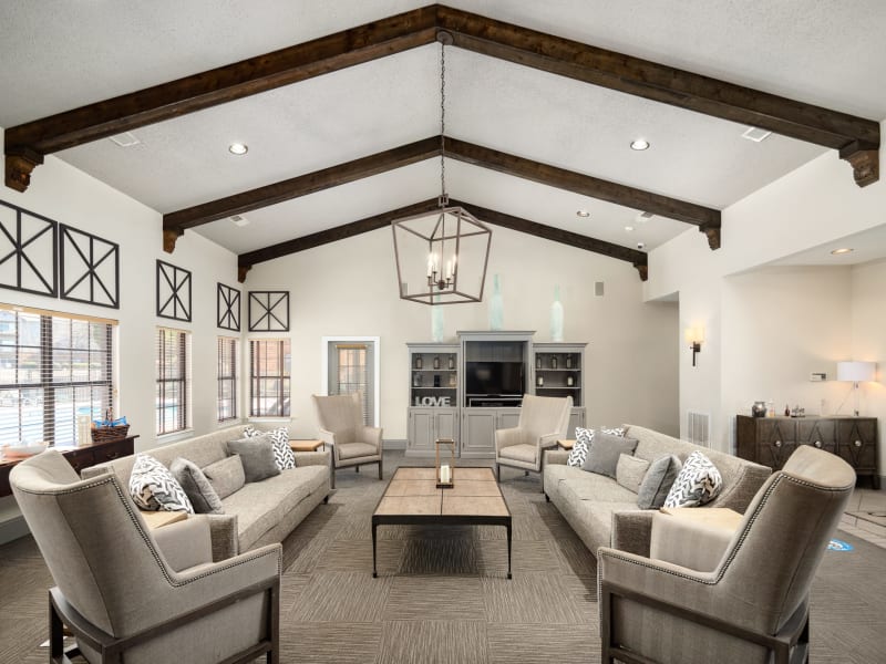 Lounge seating in the community clubhouse at The Oaks of St. Clair in Moody, Alabama