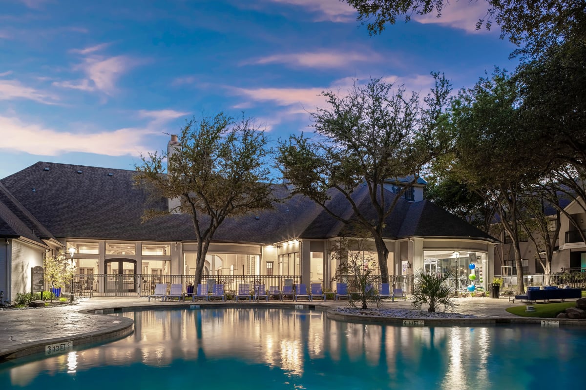 Stunning resort style pool at dusk at Marquis at Waterview in Richardson, Texas