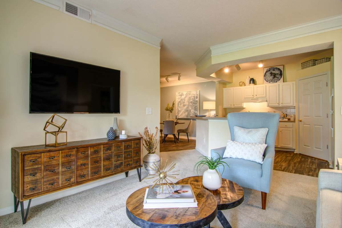 Living room with flat screen tv in an apartment at Alta Mill Apartments, Austell, Georgia
