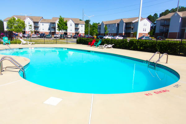 Enjoy a swimming pool at Brookstone Apartments in Fayetteville, North Carolina