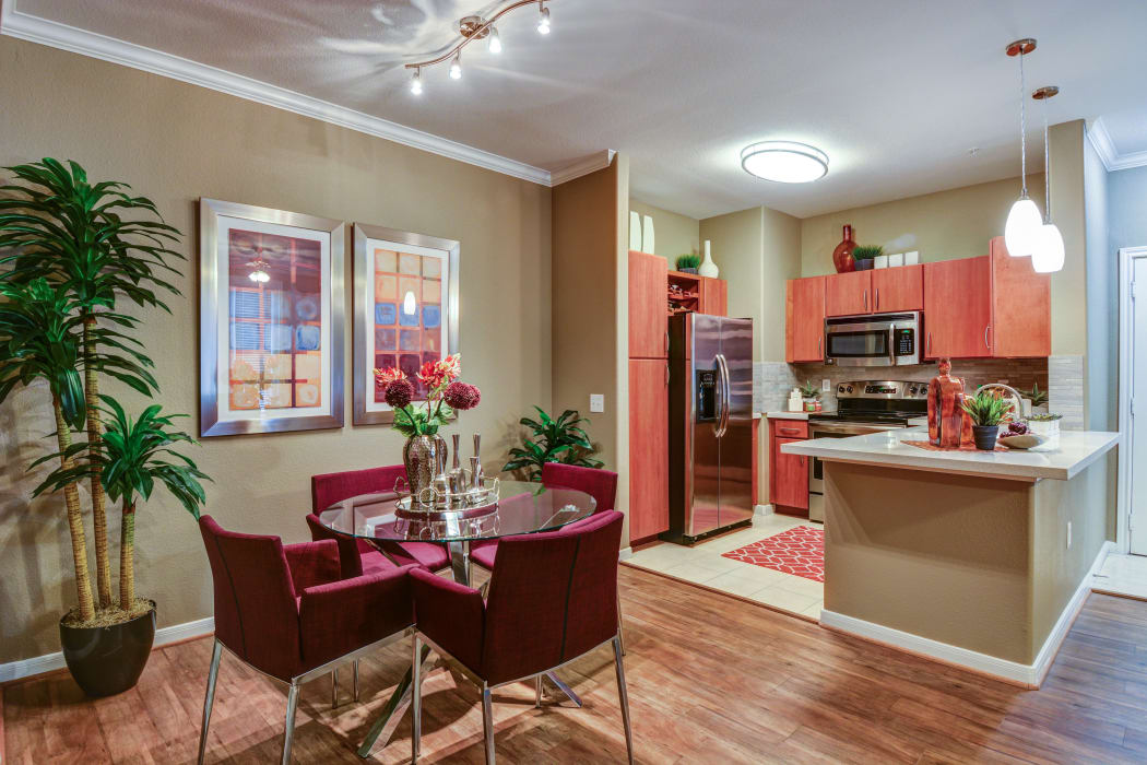 Kitchen view from the dining area of model home at San Paloma Apartments in Houston, Texas