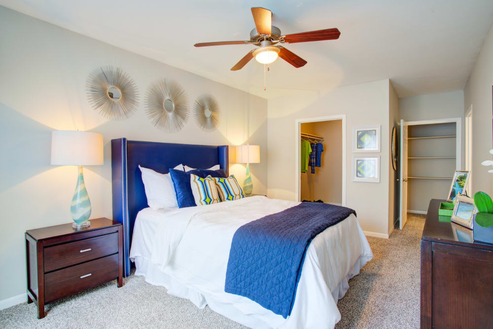 Spacious model bedroom with walk-in closet at Metro 5514 in Houston, Texas