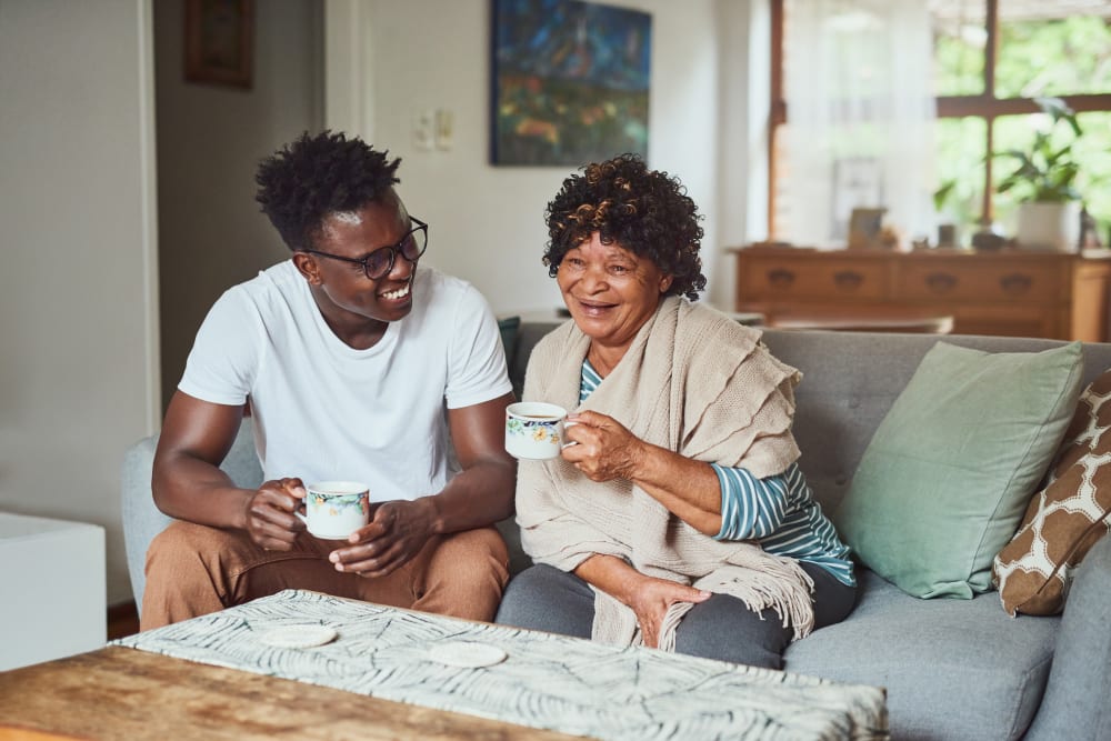 Resident with a caregiver at Barclay House of Aiken in Aiken, South Carolina