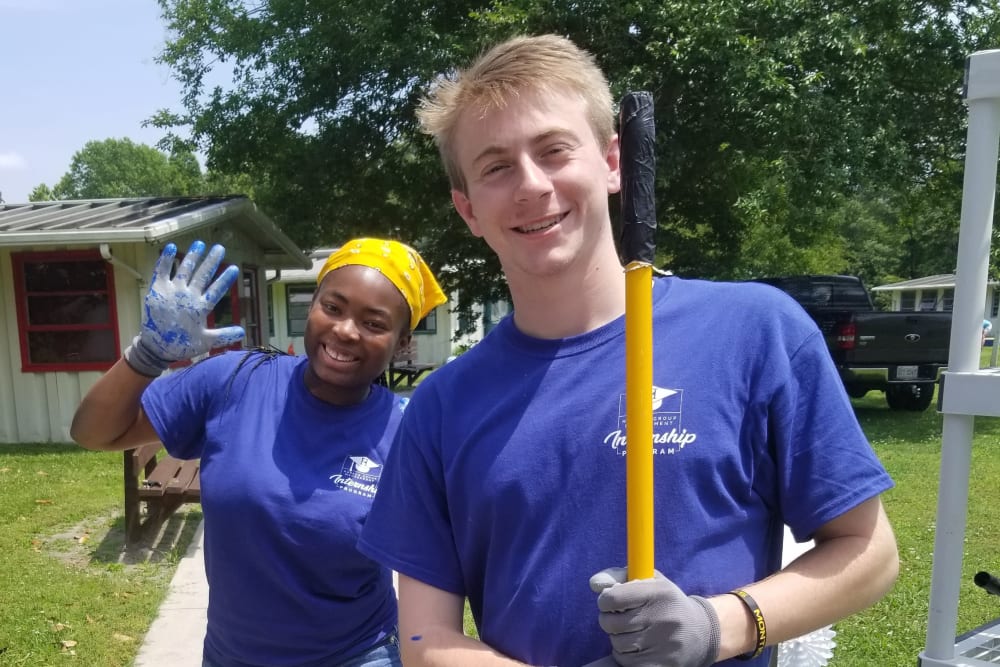 Coworkers volunteering together near Harbor Group Management in Norfolk, Virginia