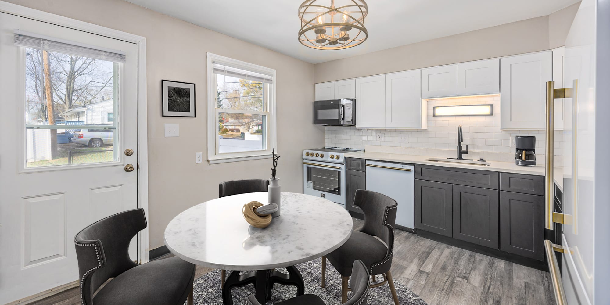 Apartment kitchen and living room at Eden Green Townhomes in Columbus, Ohio