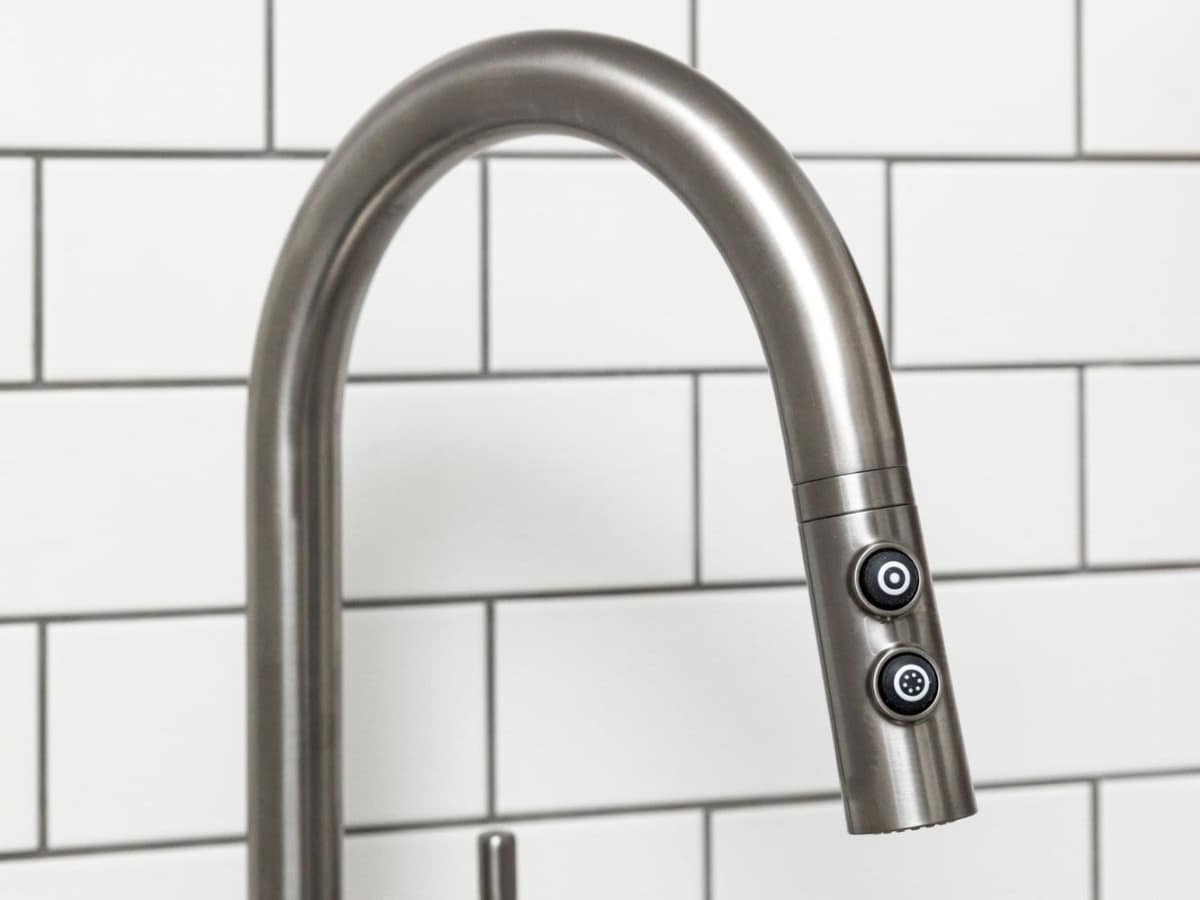Tile backsplash and modern faucet at J Vue at The LMA in Boston, Massachusetts