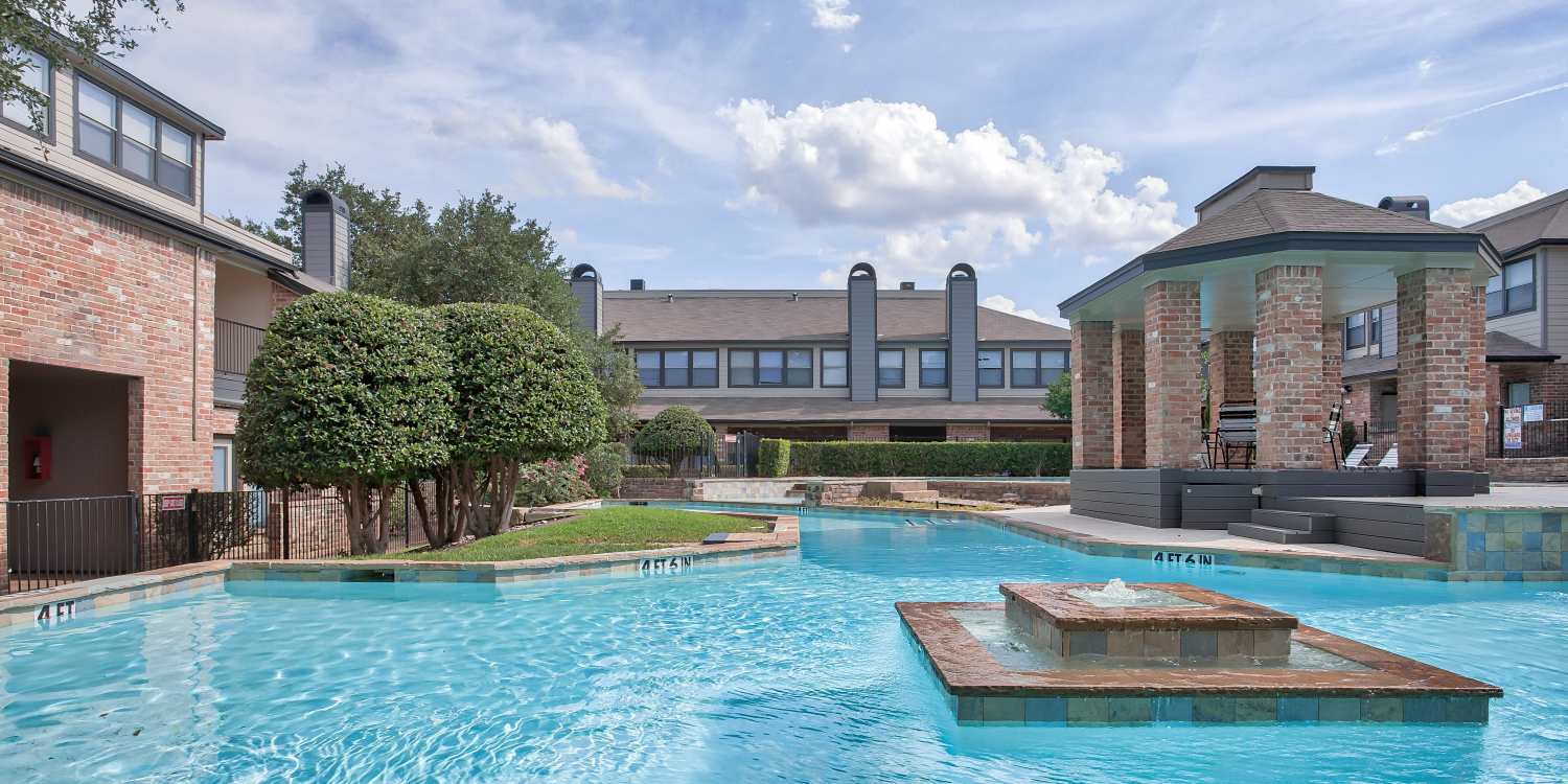 Sparkling swimming pool at Branch Creek Apartments in Carrollton, Texas