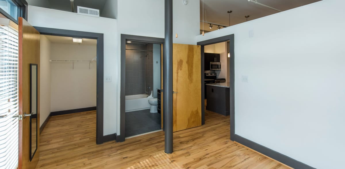 Open industrial-style apartment with plank-wood floor at Scott's Edge, Richmond, Virginia