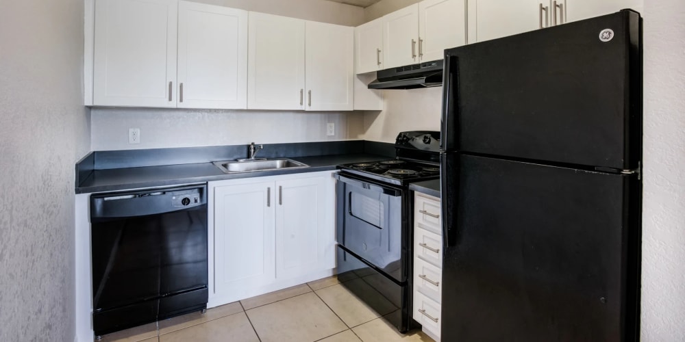 Apartment kitchen at Coronado Springs East in Palm Springs, Florida