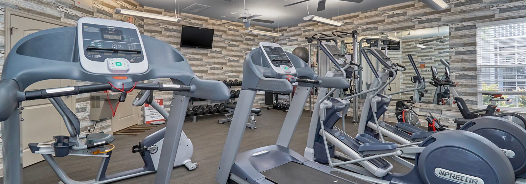 Well equipped fitness center at Columbus Station Apartments at Town Center, Virginia Beach, Virginia