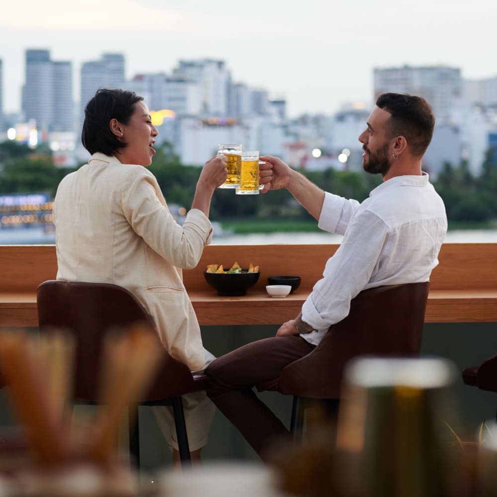 Resident couple sharing drinks at 1510 Belleville in Richmond, Virginia