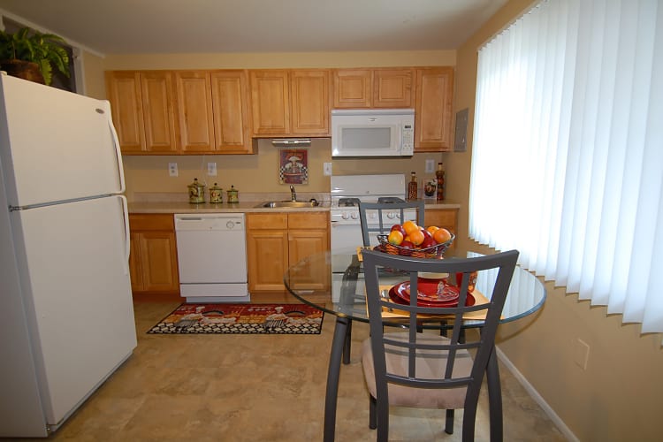 Enjoy apartments with a naturally well-lit kitchen at Gwynnbrook Townhomes