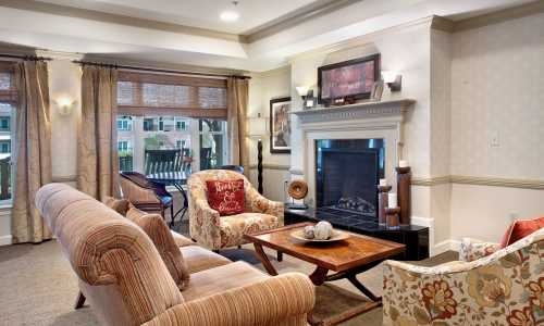 Living room with fire place at Glenncrest at Siegen in Baton Rouge, Louisiana