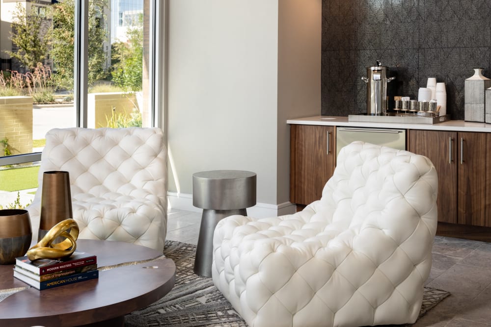 Lounge chairs in a model apartment at Instrata at Legacy West in Plano, Texas