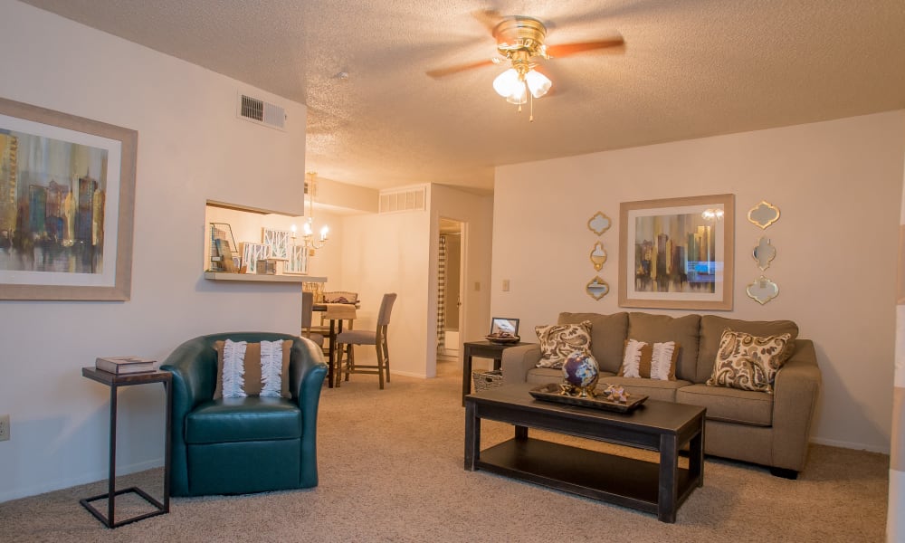 Open and bright model living room at Cimarron Pointe Apartments in Oklahoma City, Oklahoma