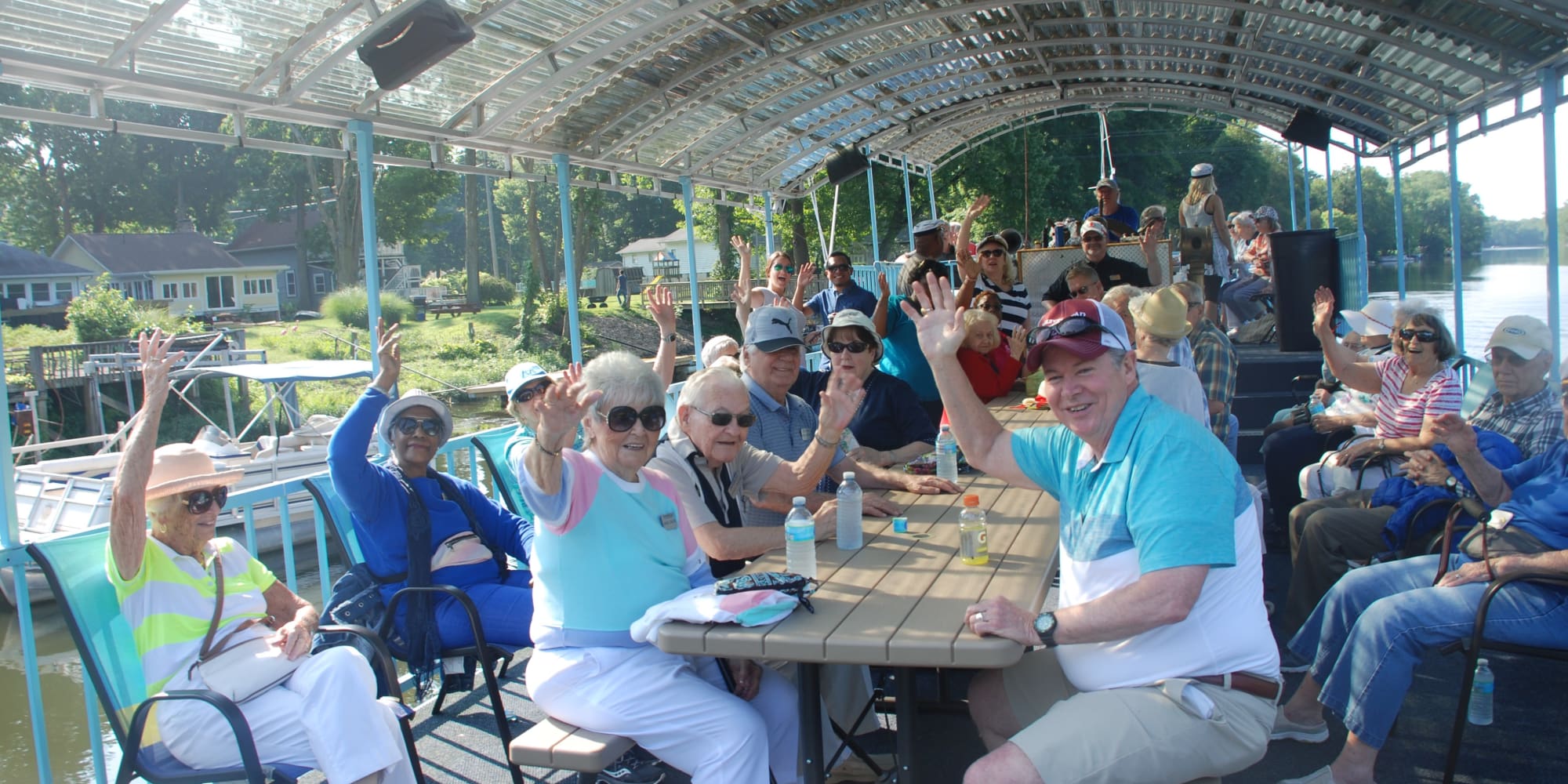 A group of residents from Salishan Gracious Retirement Living in Spring Hill, Florida on a boat