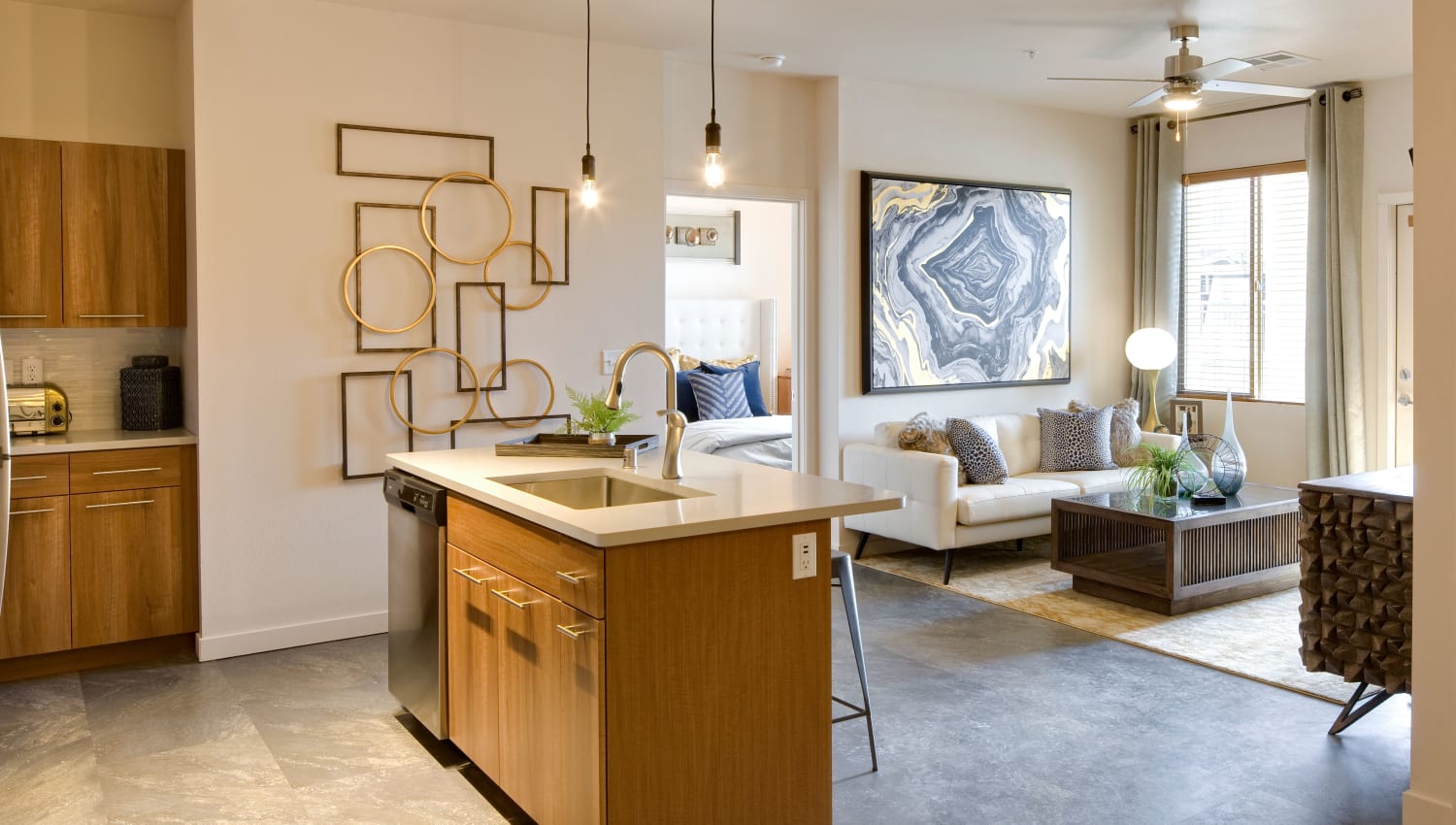 Spacious kitchen and living room in a model apartment at Olympus Alameda in Albuquerque, New Mexico