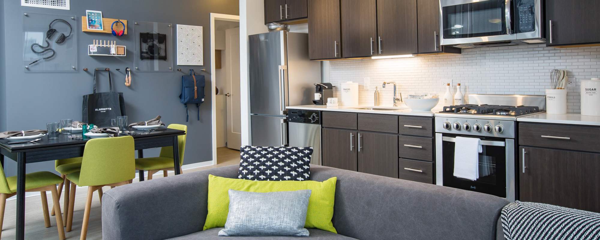 Kitchen and dining table at Exhibit On Superior in Chicago, Illinois