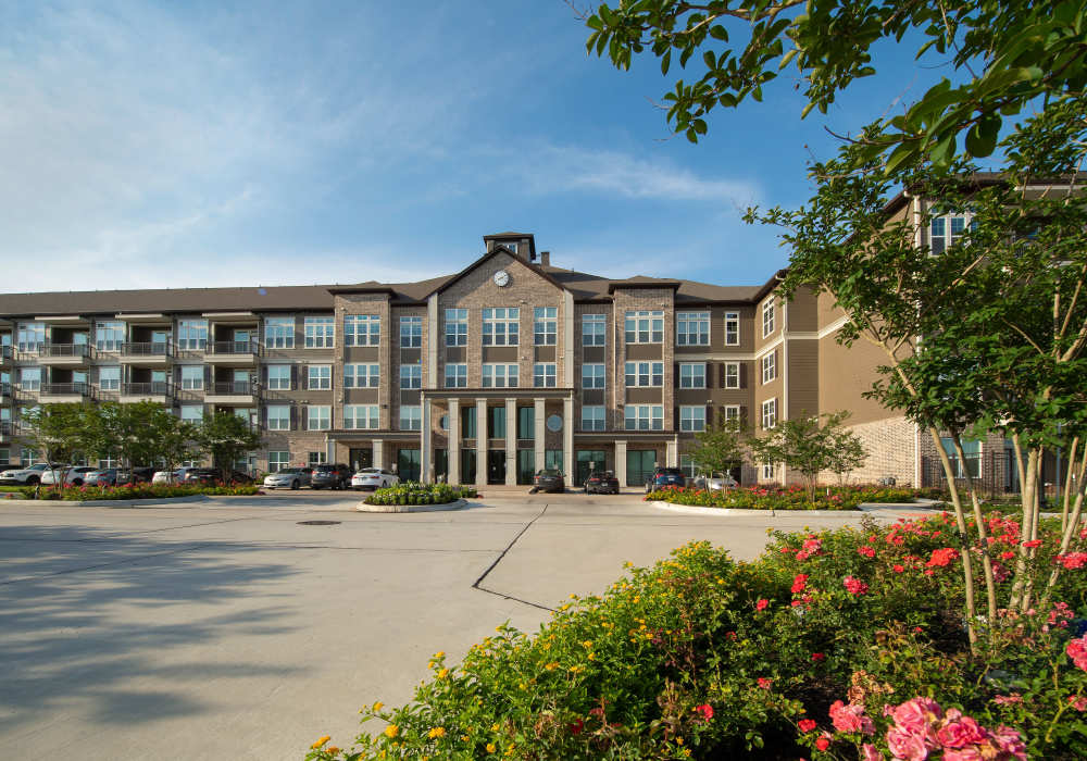 Exterior view of the community building at Orleans at Fannin Station in Houston, Texas