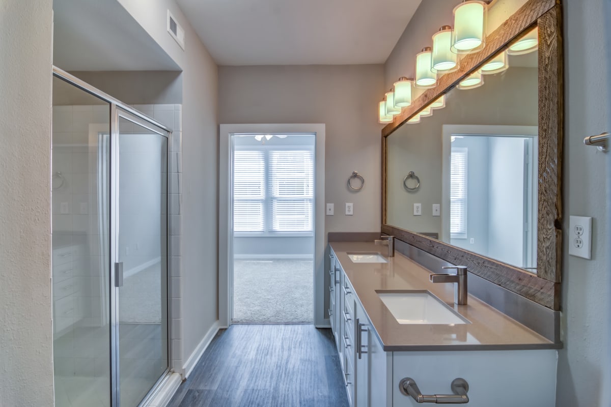Dual sinks in an apartment bathroom at Biltmore at Midtown in Atlanta, Georgia