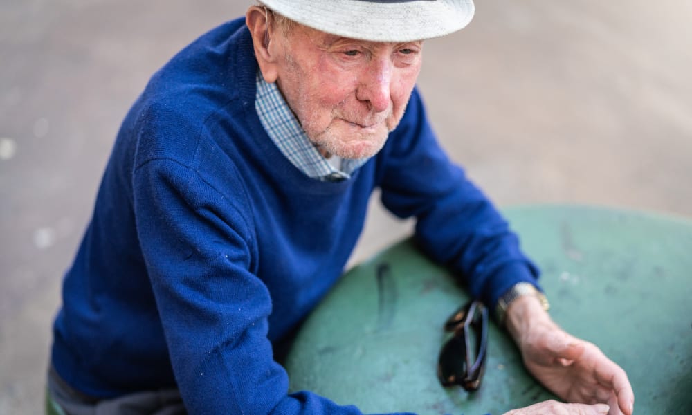 Resident sitting outside at Randall Residence