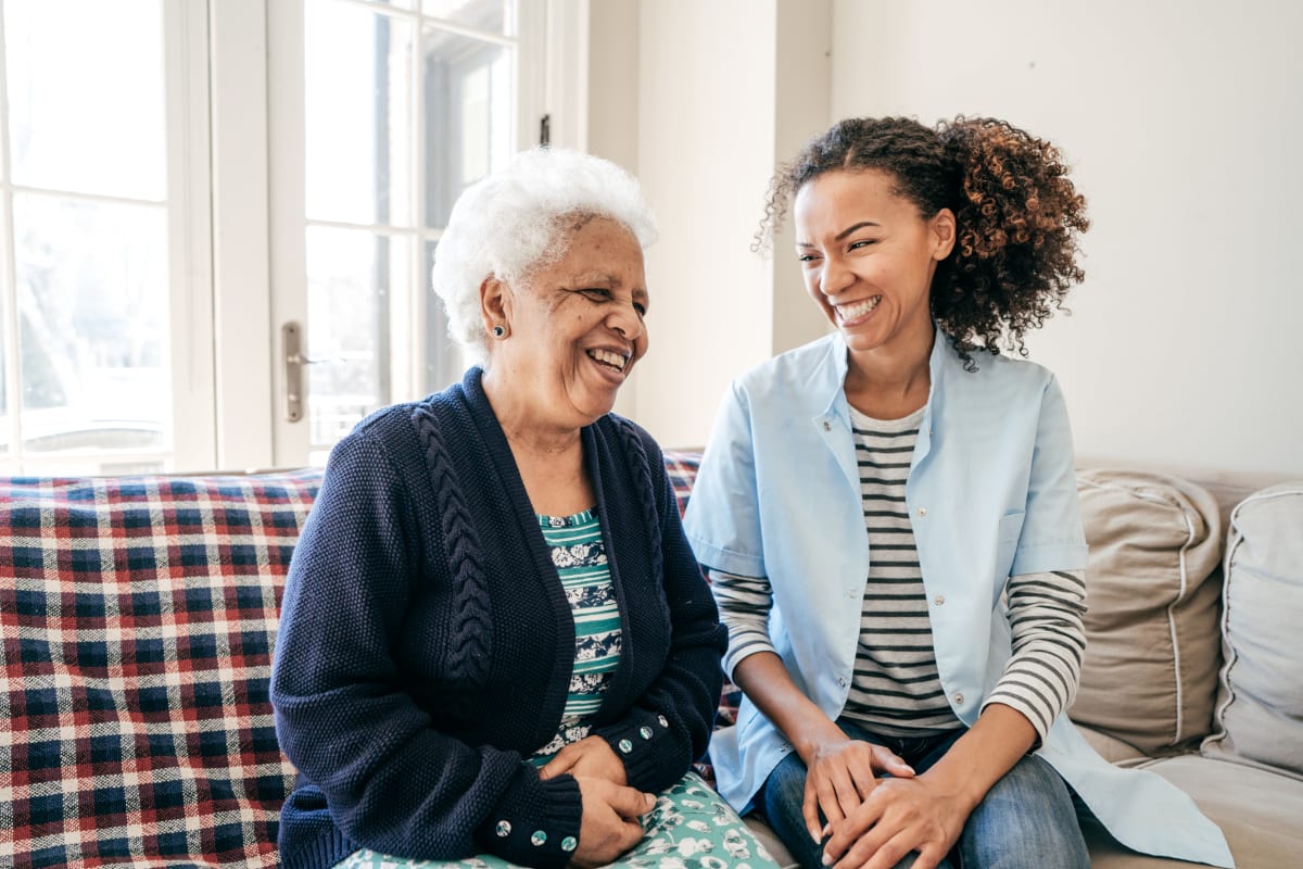 Two women discussing living options at Clearview Lantern Suites in Warren, Ohio