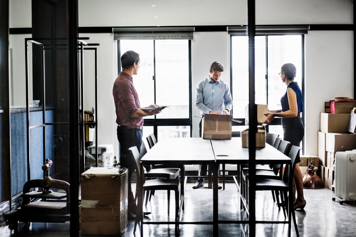 Employees having a work meeting at Extra Attic Mini Storage 