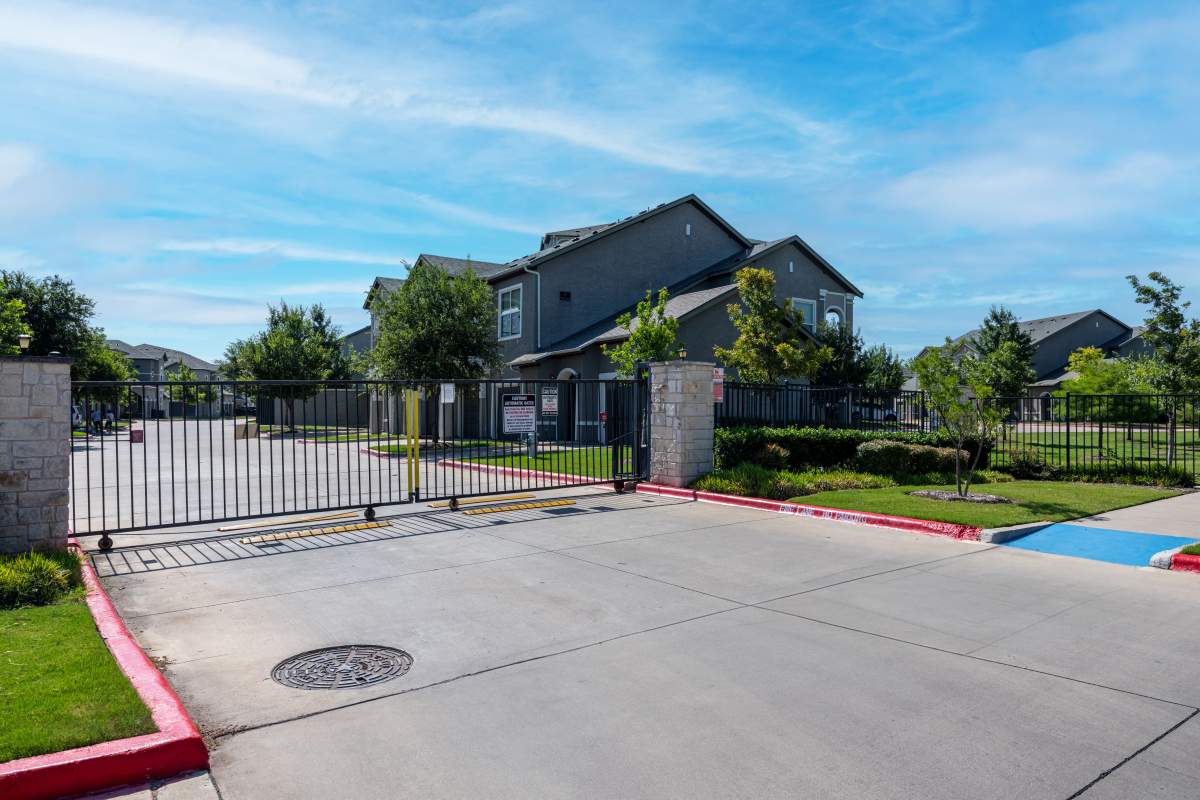 Property entrance gate at Century Travesia in Austin, Texas